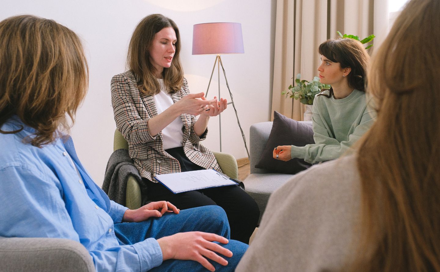 A thriving team of therapists collaborating in a supportive, healthy practice environment